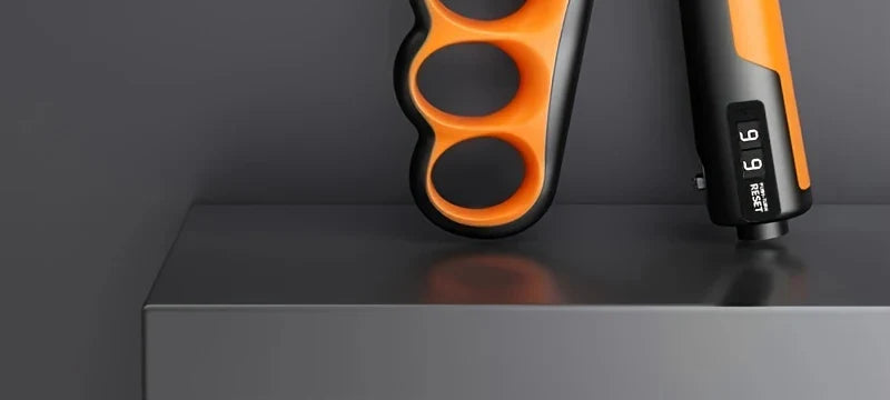 Orange adjustable hand grip strengthener with digital counter