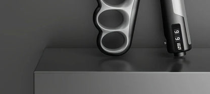 Grey adjustable hand grip strengthener with digital counter
