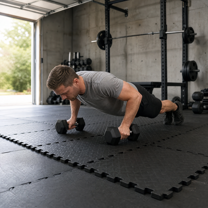 Interlocking black foam floor tiles in a garage gym