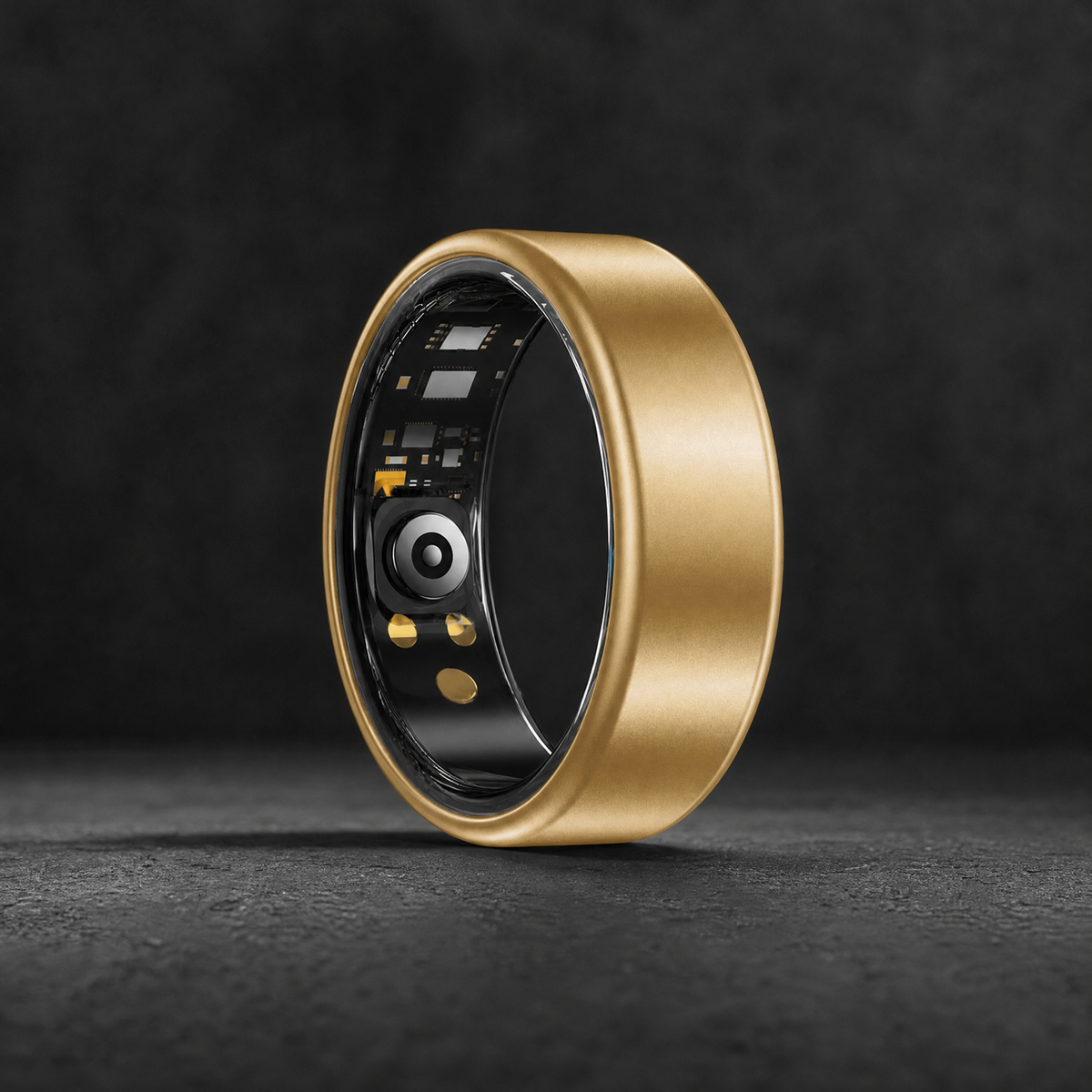 Gold smart ring showing the sensors inside
