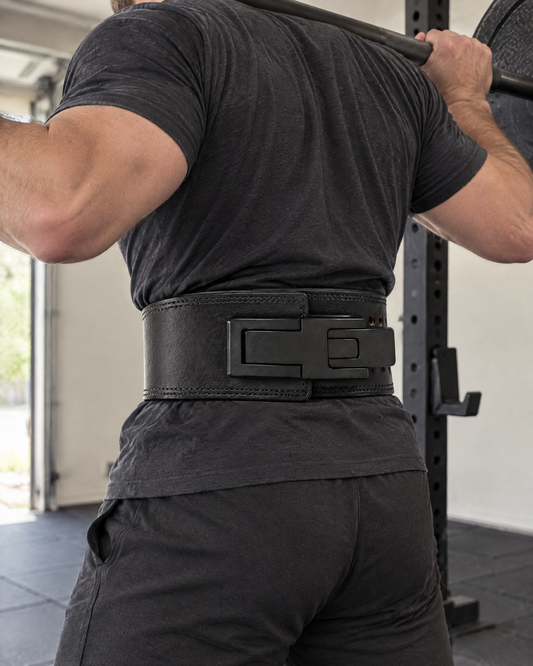 Leather Lever Lifting Belt worn for squats in a home gym