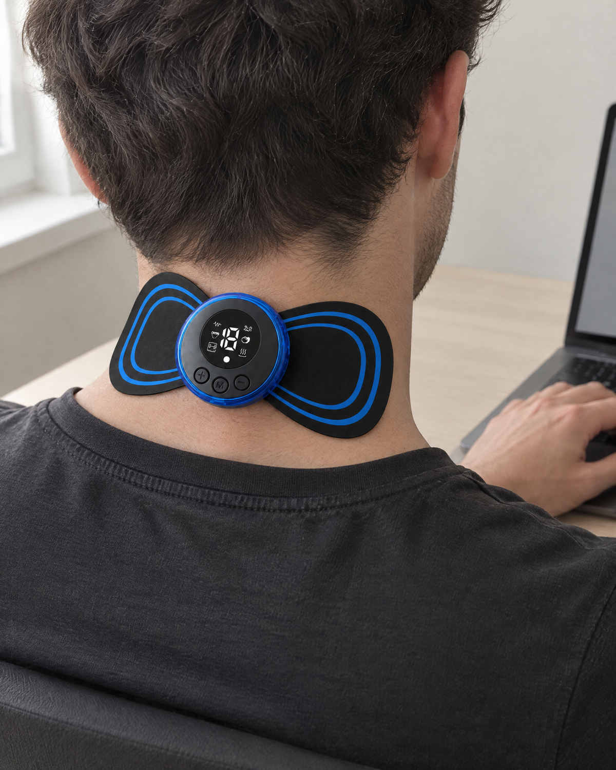 EMS Neck Massager worn at a desk