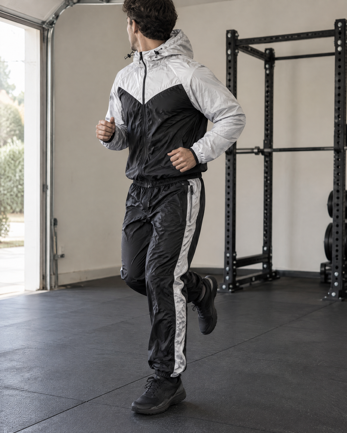 2 Piece Sauna Suit worn in a home gym