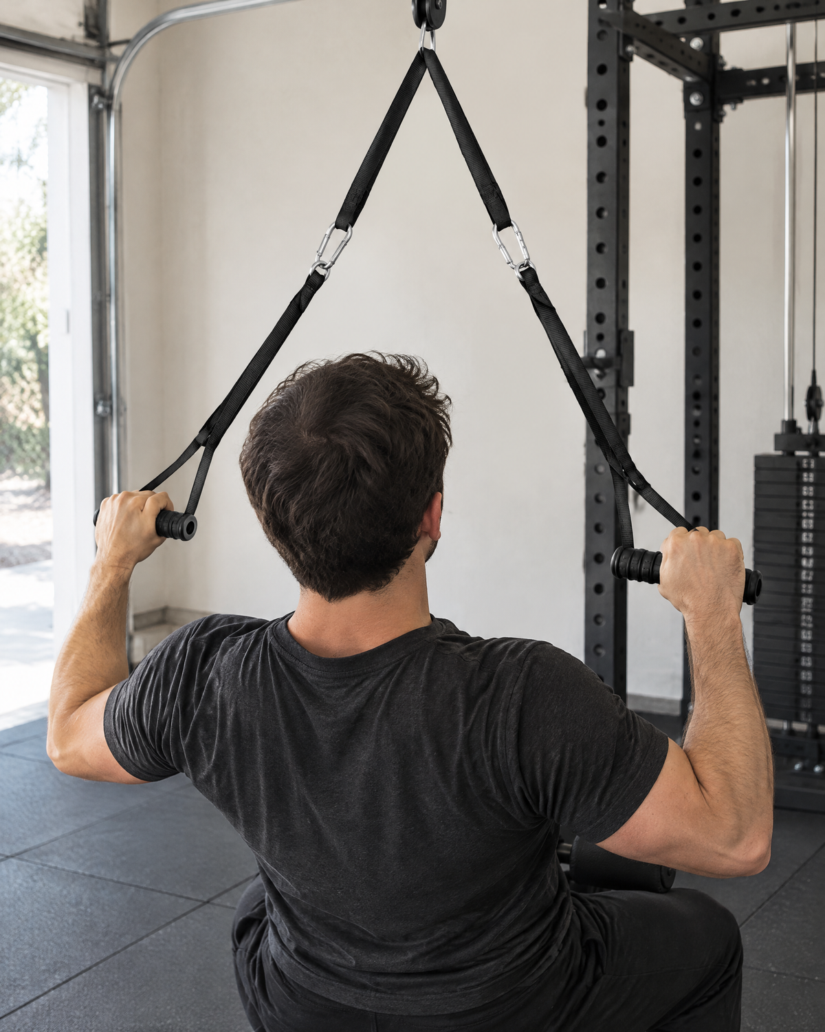 Lat Pulldown Cable Strap Attachment in use in a home gym