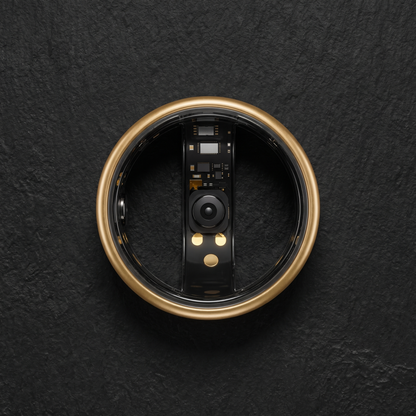 Smart ring flat lay on a black surface