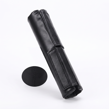 Black leather barbell pad on a pure white background